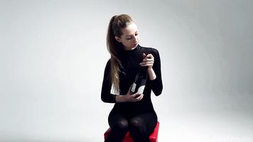 Petite Areana Fox masturbates with a bottle